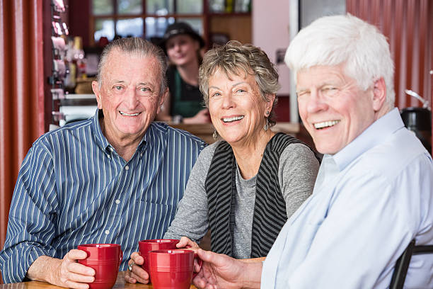 istock Happy Mature Group in Coffee House 618422846
