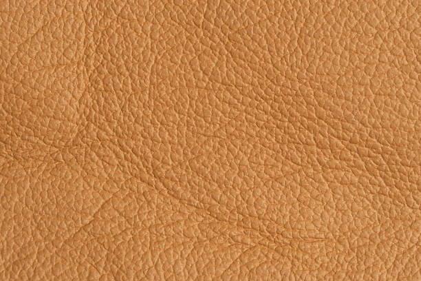 istock close up leather beige textured background 618422850