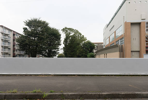 istock Large blank billboard on a street wall 618423092