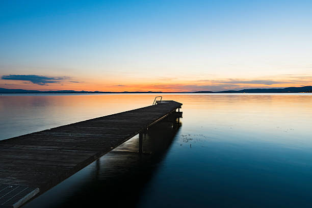 istock Sunset from the pier on the lake 618424554
