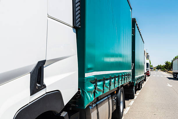 istock Trucks parked on a street 618425270
