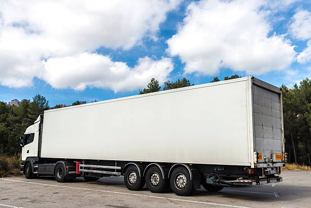 istock White truck parked 618425560
