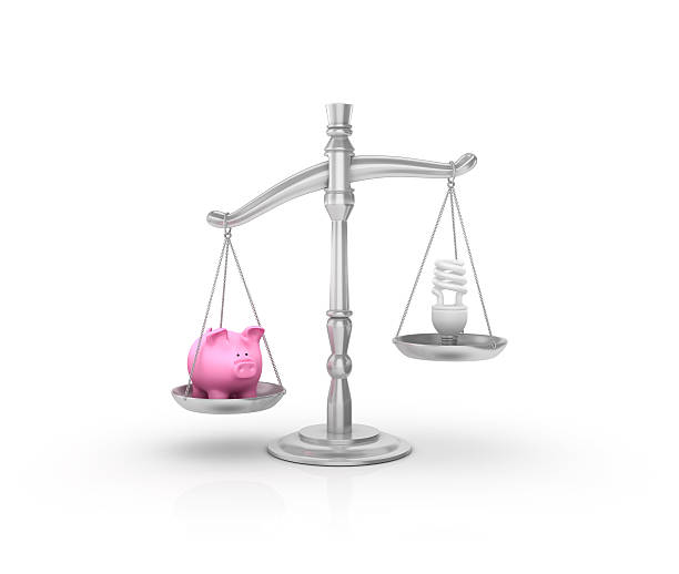 istock Weight Scale with Piggy Bank and Light Bulb 618425968