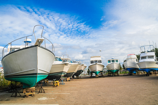 Several motor yachts have been pulled out of the water and placed on blocks for winter storage at the Sandwich Marina.