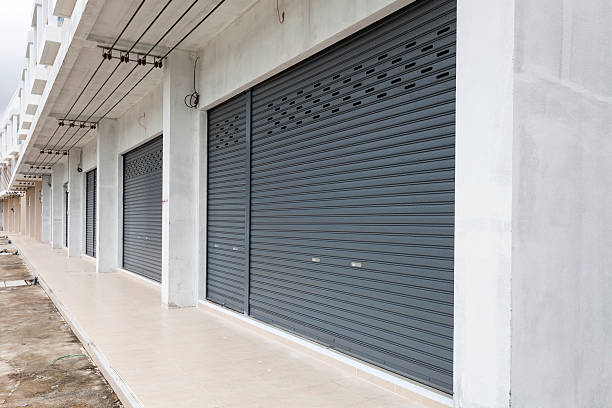 istock Shutter door or roller door and concrete floor 618426720