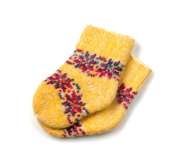 istock knitted woolen socks on a white background 618427484