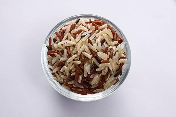 istock brown rice mixed in glass bowl 618428620