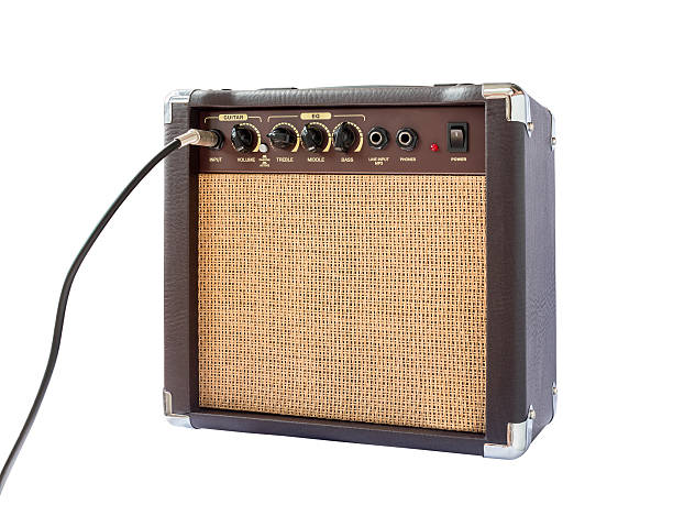 istock Small acoustic guitar amplifier isolated on white background 618430448