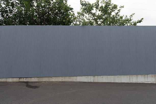 istock Large blank billboard on a street wall 618431110