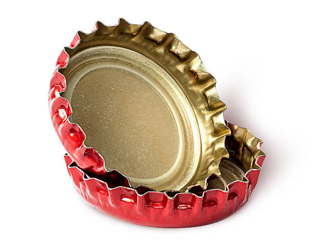 istock Closeup of two red caps from beer bottles 618431806