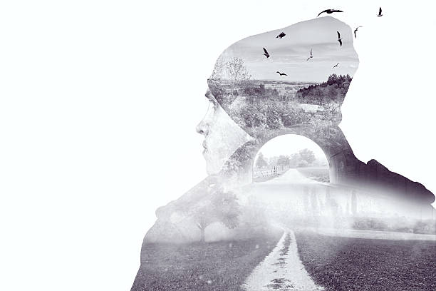 istock double exposure of young thinking man with nature and birds 618433794