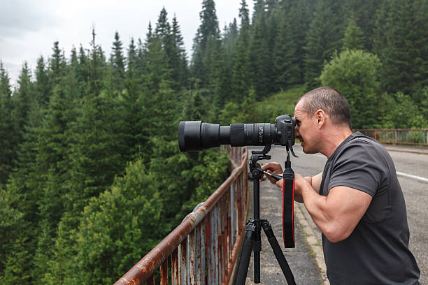 istock Professional photographer outdoor 618436110