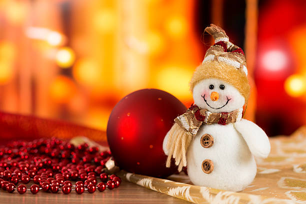 istock Snowman, red ball, golden balls and cones. 618440238