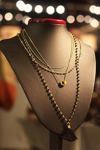 istock gold jewelry on a mannequin 618440342