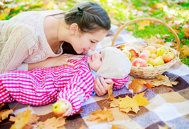 istock mother and baby outdoor 618440954