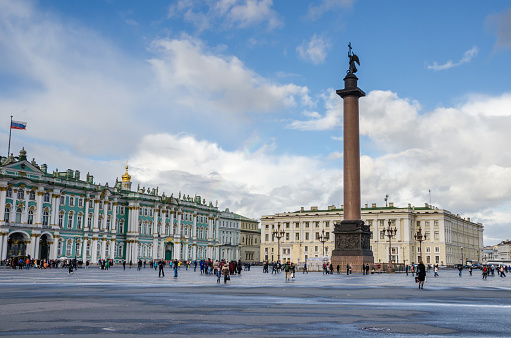 Saint Petersburg, Russia - September 30, 2016: Palace Square with Winter Palace, the Alexander Column, red granite column (the tallest of its kind in the world), and the Guard Corps Headquarters behind