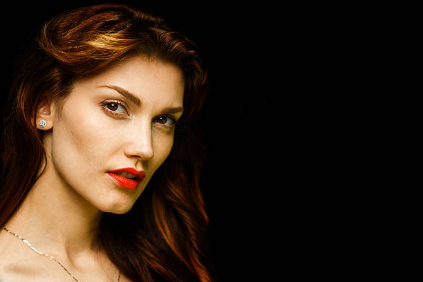 mysterious portrait portrait of a girl close-up on a black background big fat lips stock pictures, royalty-free photos & images