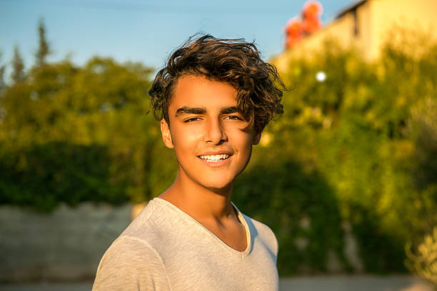 istock Portrait of laughing young man looking at camera 618442652