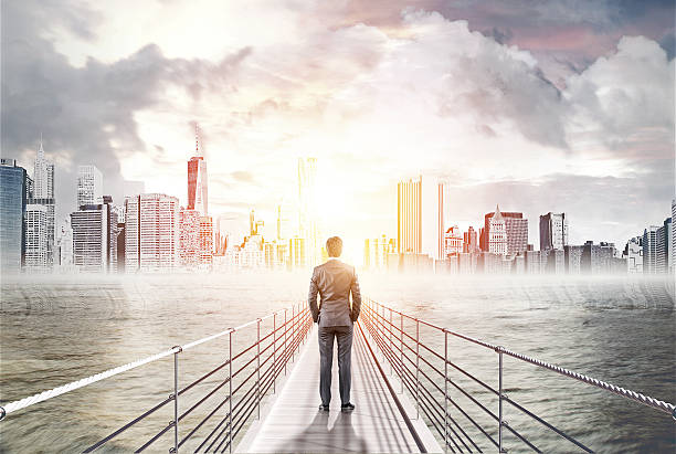 istock Rear view of businessman on bridge 618443008