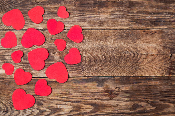 istock Red heart on wooden background 618446286