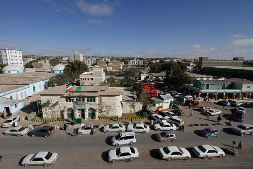Hargeisa,Somaliland - May 06, 2015: Cars passing through the main road in Hargeisa, capital city of Somaliland. Somaliland is a self-declared state internationally recognized as an autonomous region of Somalia.