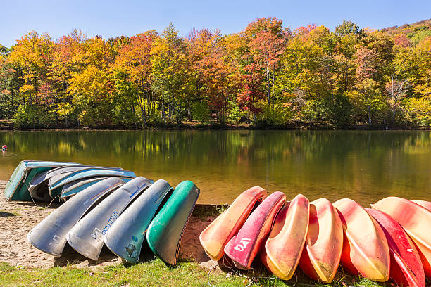 Kayaks, Canoes and Row Boats on Little Pond stock photo