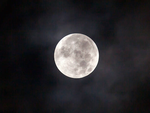 istock Close up of full moon in cloud 618449936