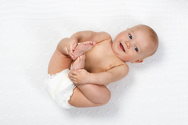 istock Funny little baby wearing a diaper 618450380