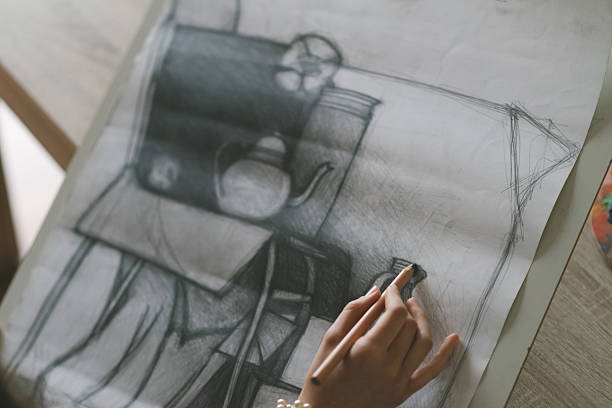 istock Young woman drawing a picture. 618453056