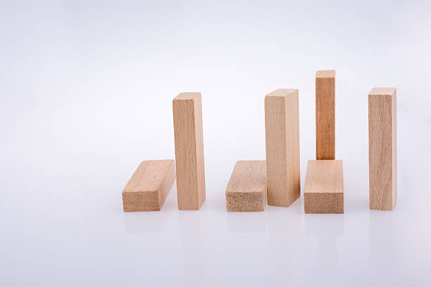 istock Calculator and calculator and wooden domino  on white background 618453904