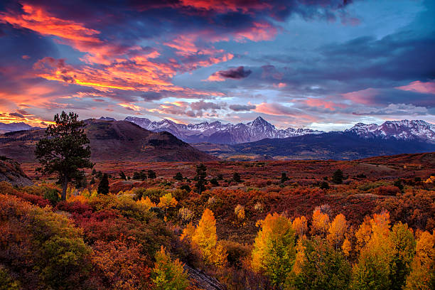 Vibrant Mountain Sunrise Dramatic autumn sunrise at the Dallas Divide at Colorado's San Juan Mountains ridgway stock pictures, royalty-free photos & images