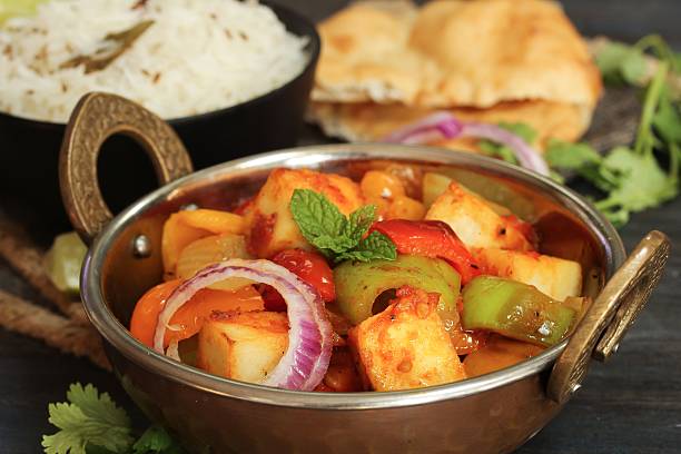 istock Kadai Paneer served with rice and Bhatura 618455244