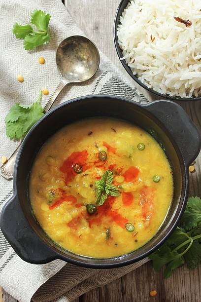 istock Lentil Curry / Dal Tadka overhead view 618455340