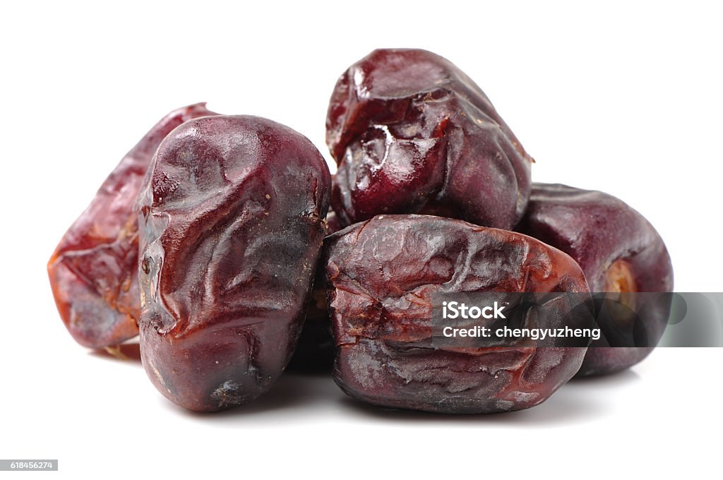 medjool dates medjool dates on white background Backgrounds Stock Photo