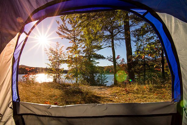 istock Lake view from inside a tent. Vintage colors 618457448