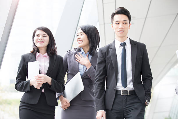 istock businesspeople talk in office 618460666