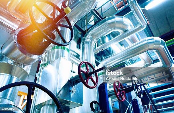 Industrial Zone Steel Pipelines Valves And Cables Stock Photo - Download Image Now