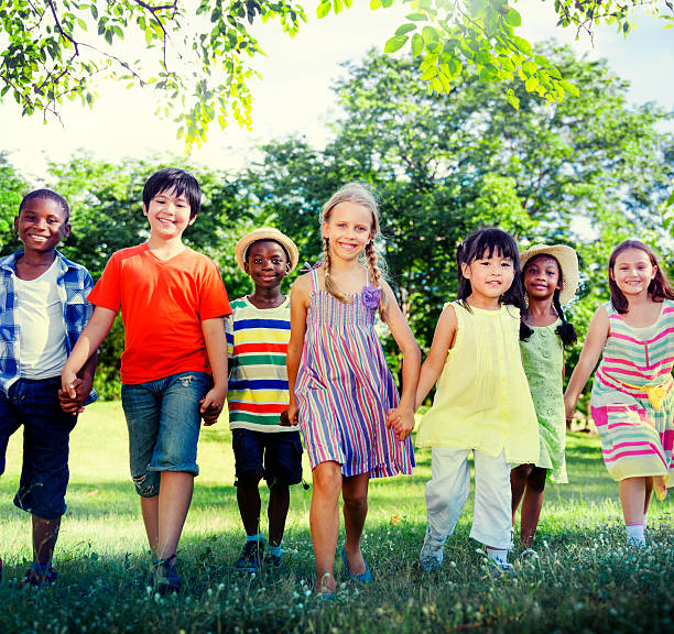 istock Diverse Children Friendship Playing Outdoors Concept 618512924