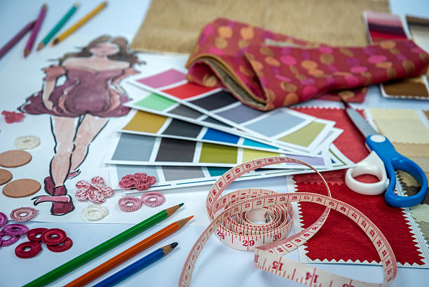 istock Fashion designer studio with sketch of clothes and samples 618513052