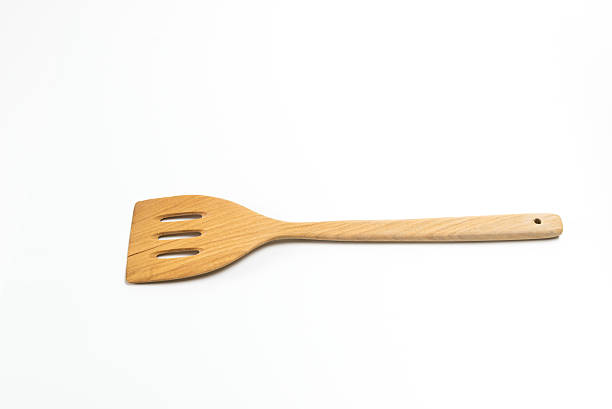 istock Wooden flipper or spade isolated on white background 618516256