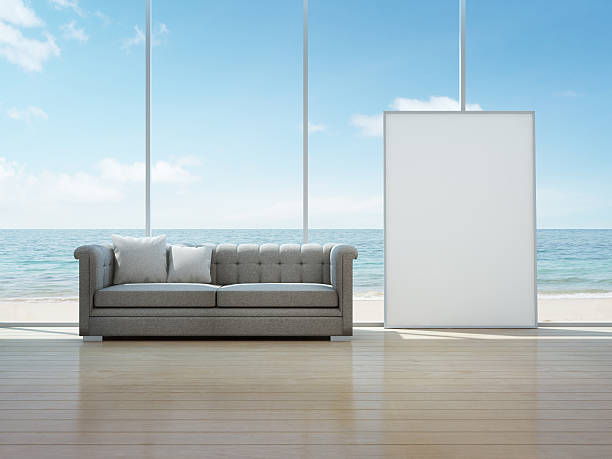 istock White art frame in sea view interior of modern house 618516402