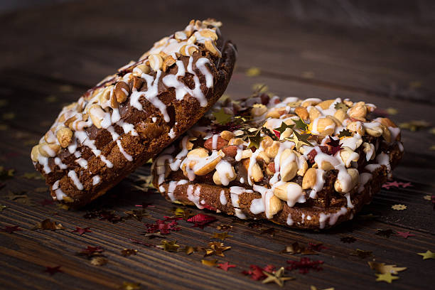 istock piece of cake, cookies with nuts and white icing, Christmas 618519488