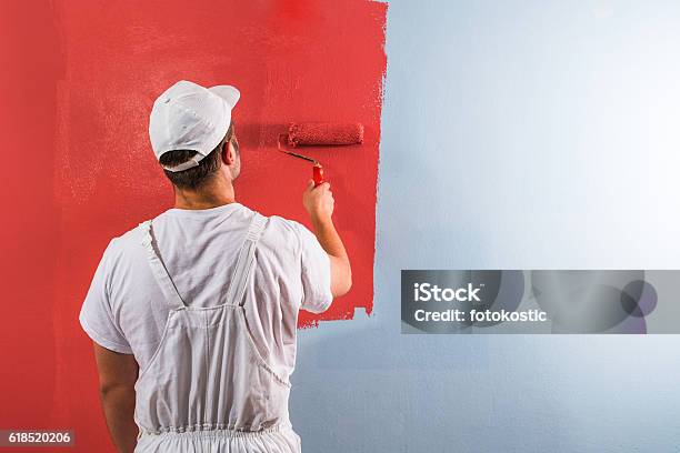 Man Painting Wall With Roller Stock Photo - Download Image Now - House Painter, Expertise, Professional Occupation