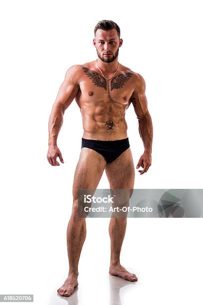 Handsome Topless Muscular Man Standing Isolated Stock Photo - Download Image Now - Men, Full Length, Naked