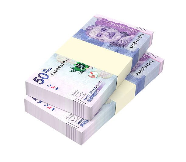 istock Stack of Colombian pesos bills isolated over white 618525078