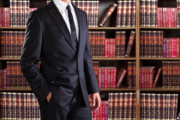 istock Midsection Of Lawyer With Hand In Pocket 618526328