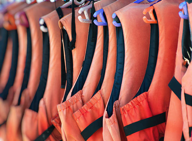 istock Many life jackets on the beach. 618526588