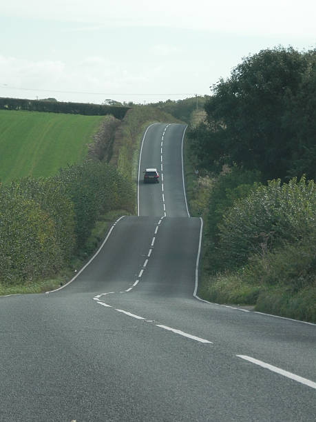 istock Hilly country road 618527002