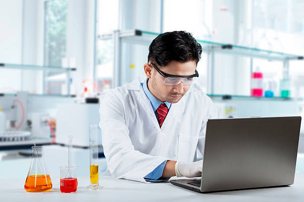 istock Scientist working in the lab with laptop 618527178