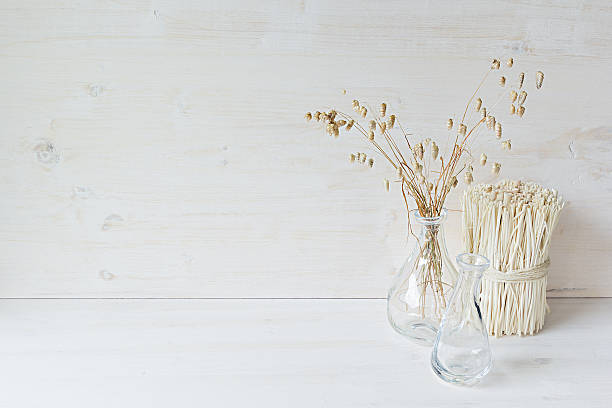 istock Decor of  vase  spikelets and stalks on white wood background. 618529888